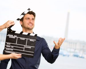 Director Clapping The Clapper Board, Outdoor